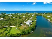 Aerial View of Canal. - Single Family Home for sale at 62 Tarpon Way, Placida, FL 33946 - MLS Number is D6121925