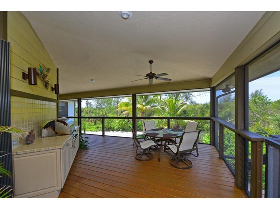 Outside Eating Area - Single Family Home for sale at 631 Bocilla Dr, Placida, FL 33946 - MLS Number is D6122145