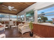 Lanai with Amazing Views and Sunsets in Upper Unit - Duplex/Triplex for sale at 4076 N Beach Rd #10 & 11, Englewood, FL 34223 - MLS Number is D6122744