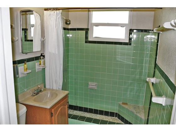 Bathroom 1 - Single Family Home for sale at 1345 Holiday Dr, Englewood, FL 34223 - MLS Number is C7449205