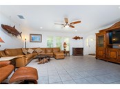 VERY SPACIOUS LIVING ROOM WITH  TILE FLOORS - Single Family Home for sale at 3400 Colony Ct, Punta Gorda, FL 33950 - MLS Number is C7451906