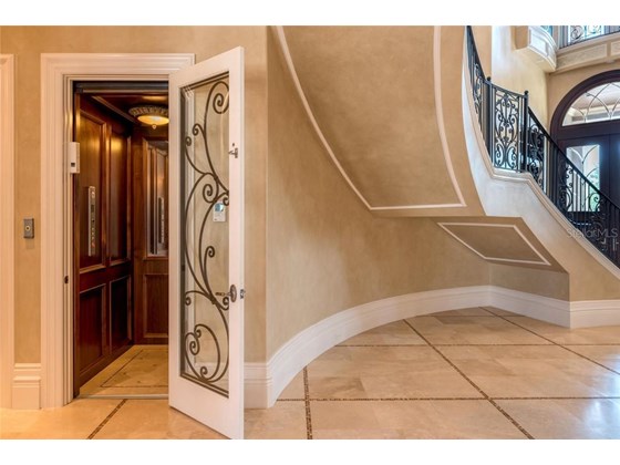 Private Elevator to the Second Level - Single Family Home for sale at 8499 Lindrick Ln, Bradenton, FL 34202 - MLS Number is A4475594