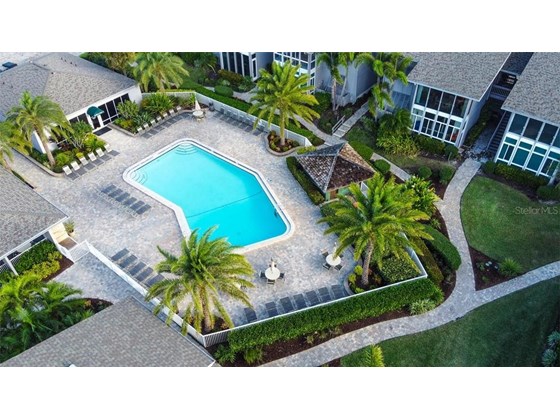 ARIEL VIEW OF THE GULFSIDE POOL - Condo for sale at 1087 W Peppertree Dr #221d, Sarasota, FL 34242 - MLS Number is A4493593