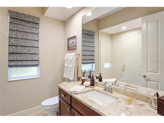 Bedroom 2's ensuite - Single Family Home for sale at 3501 Founders Club Dr, Sarasota, FL 34240 - MLS Number is A4497661