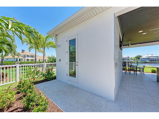 Cabana includes pool bath with outdoor shower. - Single Family Home for sale at 602 Regatta Way, Bradenton, FL 34208 - MLS Number is A4499642