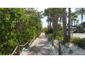 The treasured private brick paver walk way back to your investment property. - Condo for sale at 6810 Midnight Pass Rd, Sarasota, FL 34242 - MLS Number is A4507853