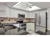 Kitchen view 2 - Condo for sale at 1055 W Peppertree Dr #501aa, Sarasota, FL 34242 - MLS Number is A4517324