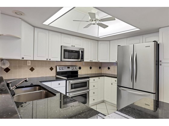 Kitchen view 2 - Condo for sale at 1055 W Peppertree Dr #501aa, Sarasota, FL 34242 - MLS Number is A4517324