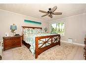 Master bedroom with Bay views - Condo for sale at 450 Gulf Of Mexico Dr #B107, Longboat Key, FL 34228 - MLS Number is A4520786