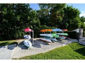 Kayak storage and launch; Outdoor shower - Condo for sale at 450 Gulf Of Mexico Dr #B107, Longboat Key, FL 34228 - MLS Number is A4520786